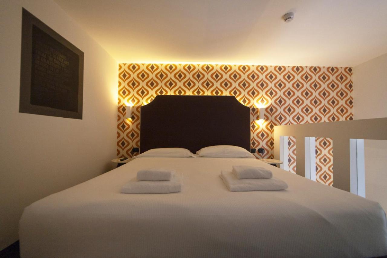 Hotel Al Campanile - Luxury Suites & Apartments Baveno Esterno foto