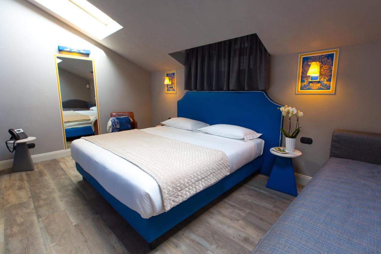 Hotel Al Campanile - Luxury Suites & Apartments Baveno Esterno foto