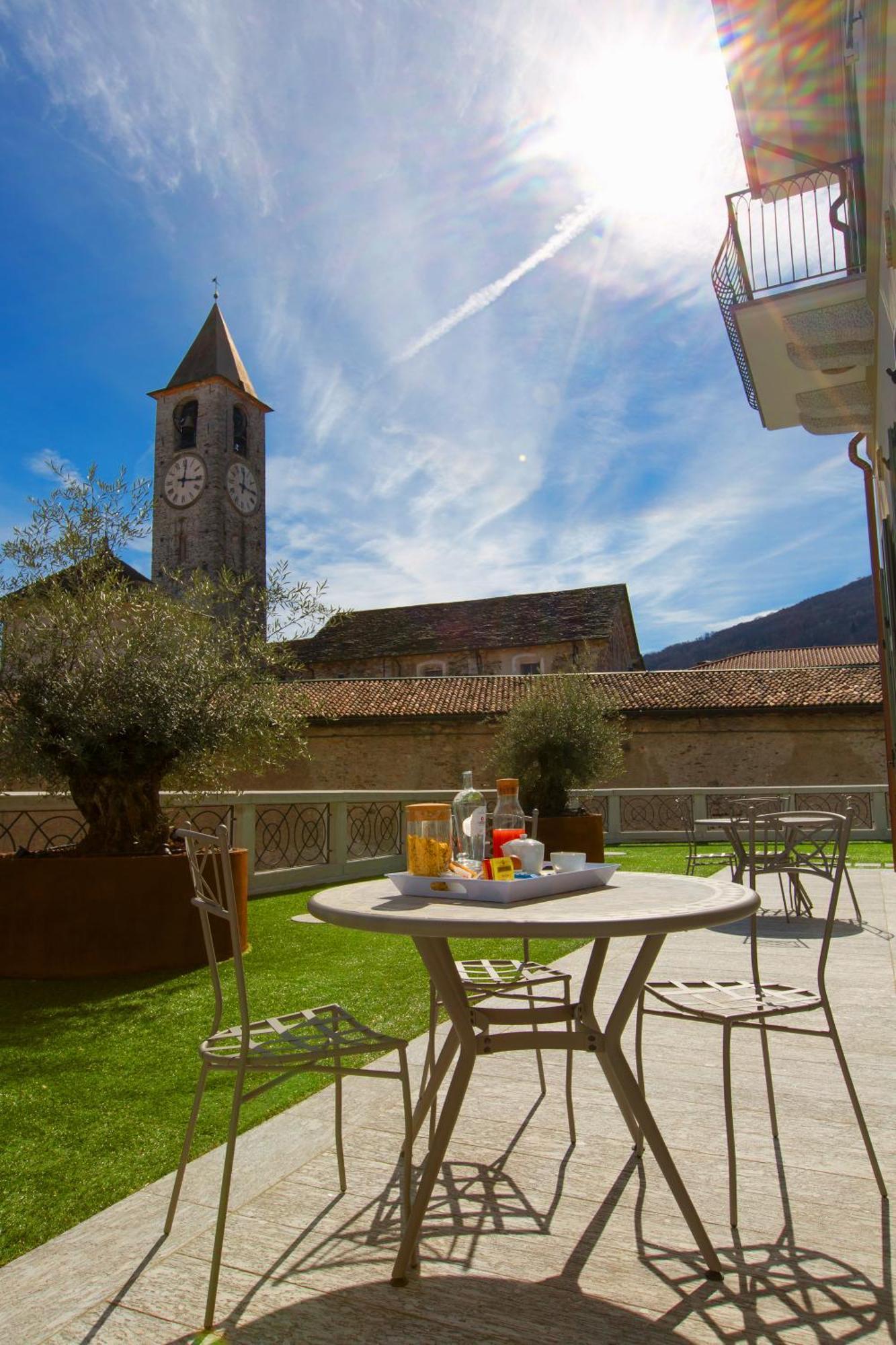 Hotel Al Campanile - Luxury Suites & Apartments Baveno Esterno foto