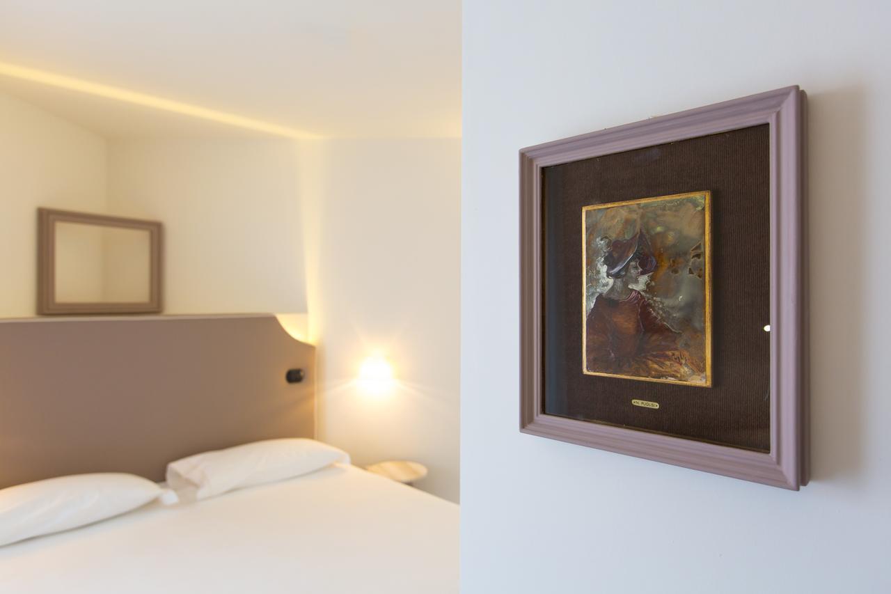 Hotel Al Campanile - Luxury Suites & Apartments Baveno Esterno foto